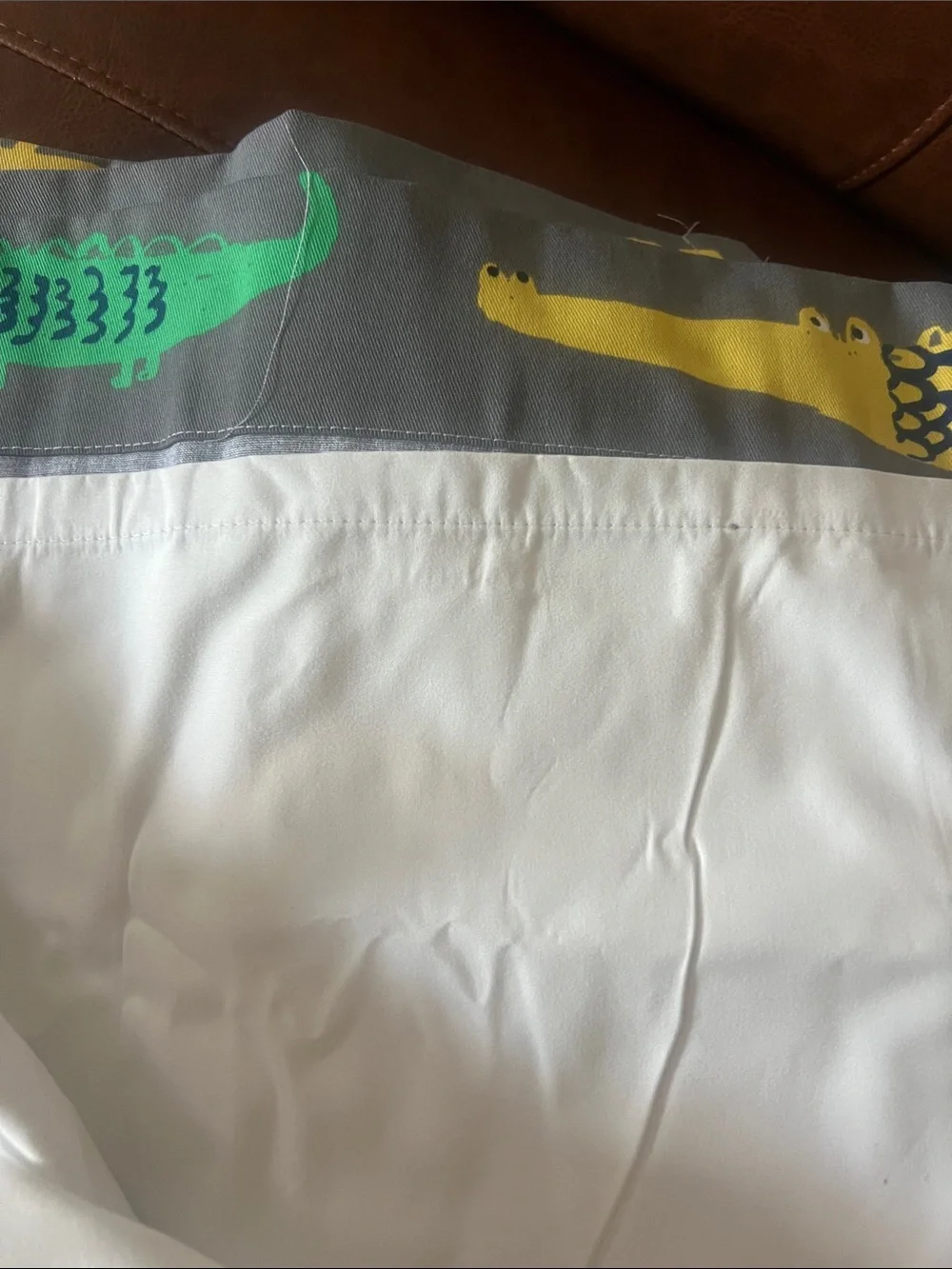 Pillowfort lined Curtain Panels with Yellow and Green Alligator Print.